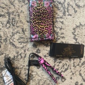 On-the-go mini hair straightener by Amika